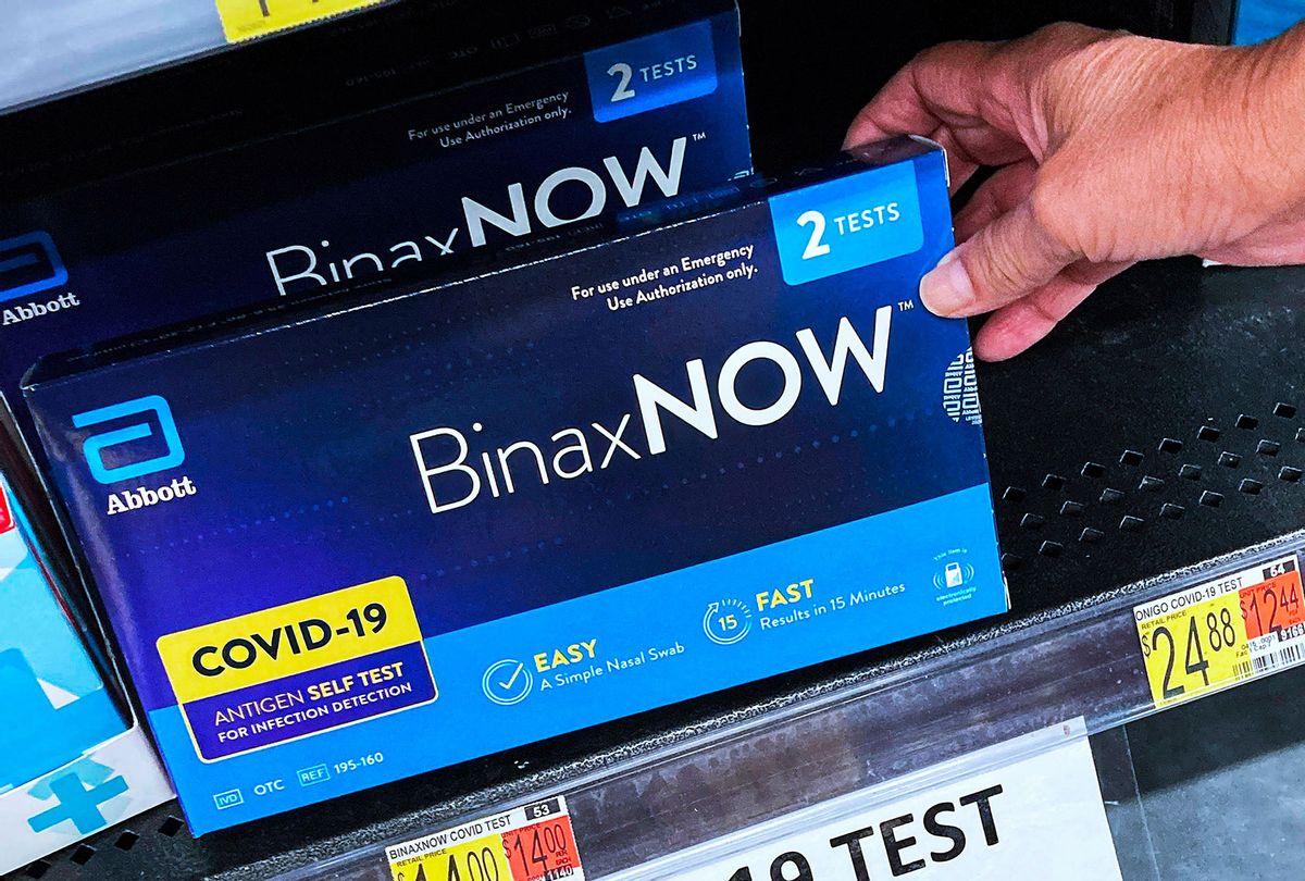 COVID-19 home rapid test kits are seen on a shelf at a Walmart Neighborhood Market in Orlando, Florida. Walmart and Kroger are raising the price for the hard-to-find BinaxNOW rapid tests after the directive from the White House to sell them at cost has expired. Test kits that were formerly sold for $14 will now retail for $19.88 at Walmart and $23.99 at Kroger. (Paul Hennessy/SOPA Images/LightRocket via Getty Images)