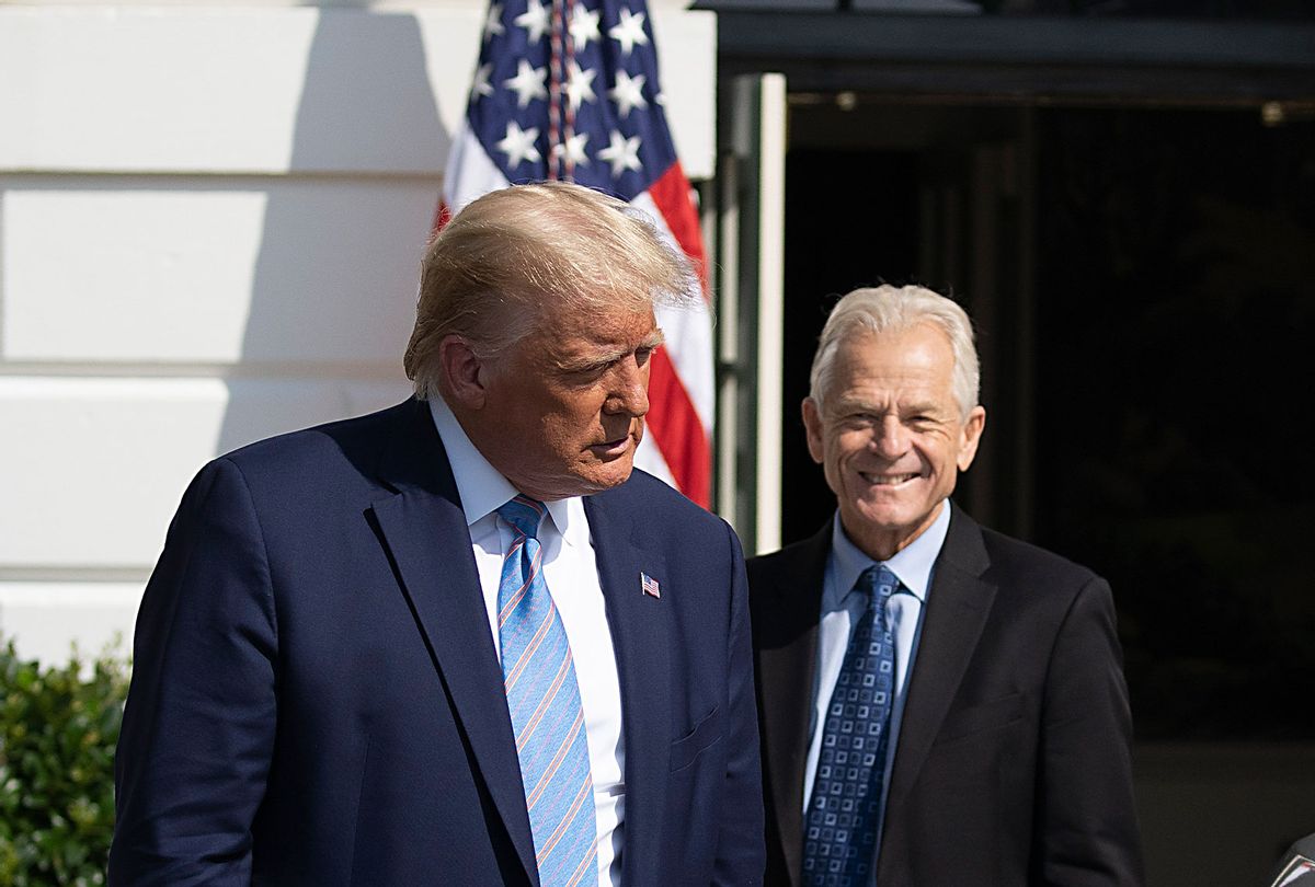 U.S. President Donald Trump and White House Trade Adviser Peter Navarro check out the new Endurance all-electric pickup truck on the south lawn of the White House on September 28, 2020 in Washington, DC. They bought the old GM Lordstown plant in Ohio to build the Endurance all-electric pickup truck, inside those four wheels are electric motors similar to electric scooters. (Tasos Katopodis/Getty Images)
