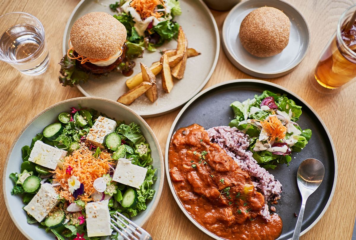 Vegan cafe lunch at Vegan Cafe. Organic curry, alternative soy meat burger, tofu salad. (Getty Images/Yagi Studio)