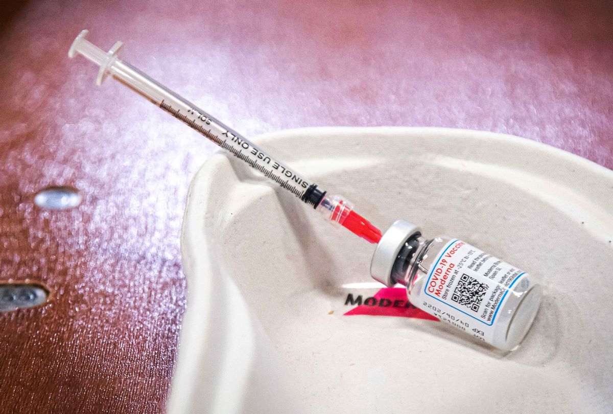 Close-up at the syringe and vial of Moderna vaccine with the Moderna inscription. (Nicolas Economou/NurPhoto via Getty Images)