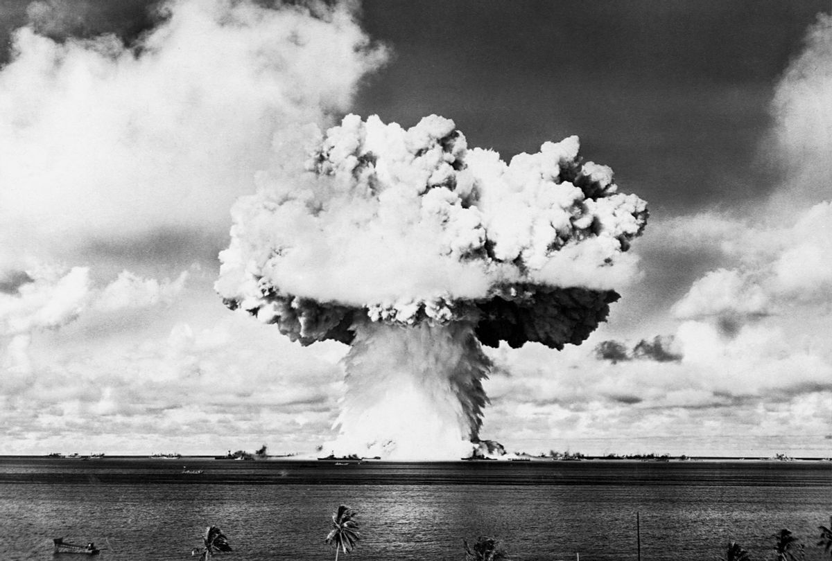 A column of water and a cloud of smoke from a nuclear bomb test conducted by the United States. (CORBIS/Corbis via Getty Images)