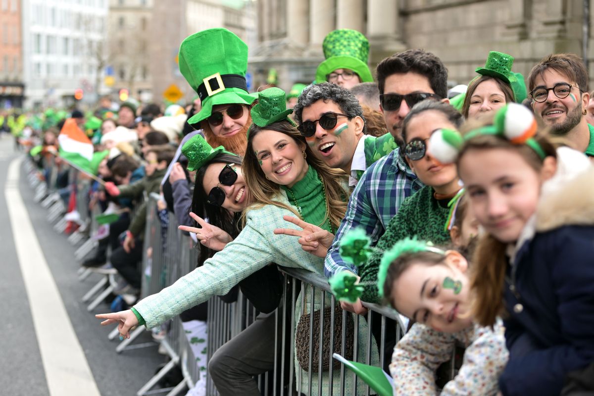 Revellers line the streets during the St Patrick's Day parade on March 17, 2022 in Dublin, Ireland. (Charles McQuillan/Getty Images)