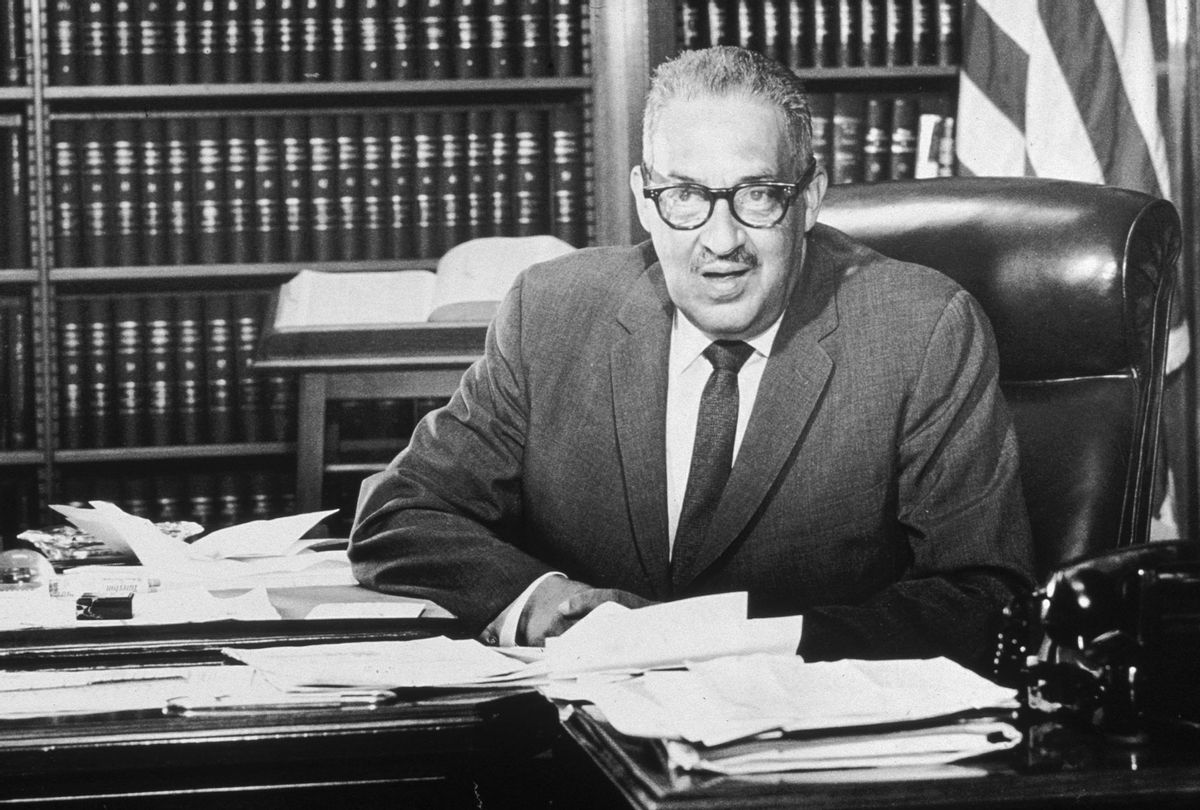 American jurist, lawyer, associate justice Thurgood Marshall (1908 - 1993), who had been recently appointed Solicitor General by President Lyndon Johnson, sits behind his desk in his office at the Federal Courthouse, Washington, DC. He later became the first black Supreme Court Justice. (Sam Falk/New York Times Co./Getty Images)