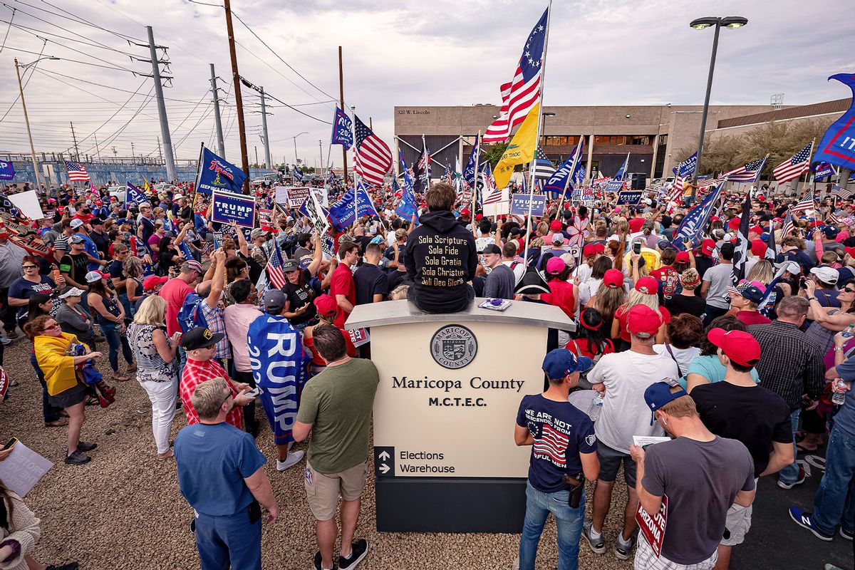 Supporters o US President Donald Trump protest in front of the Maricopa County Election Department while votes are being counted in Phoenix, Arizona, on November 6, 2020. (OLIVIER TOURON/AFP via Getty Images)