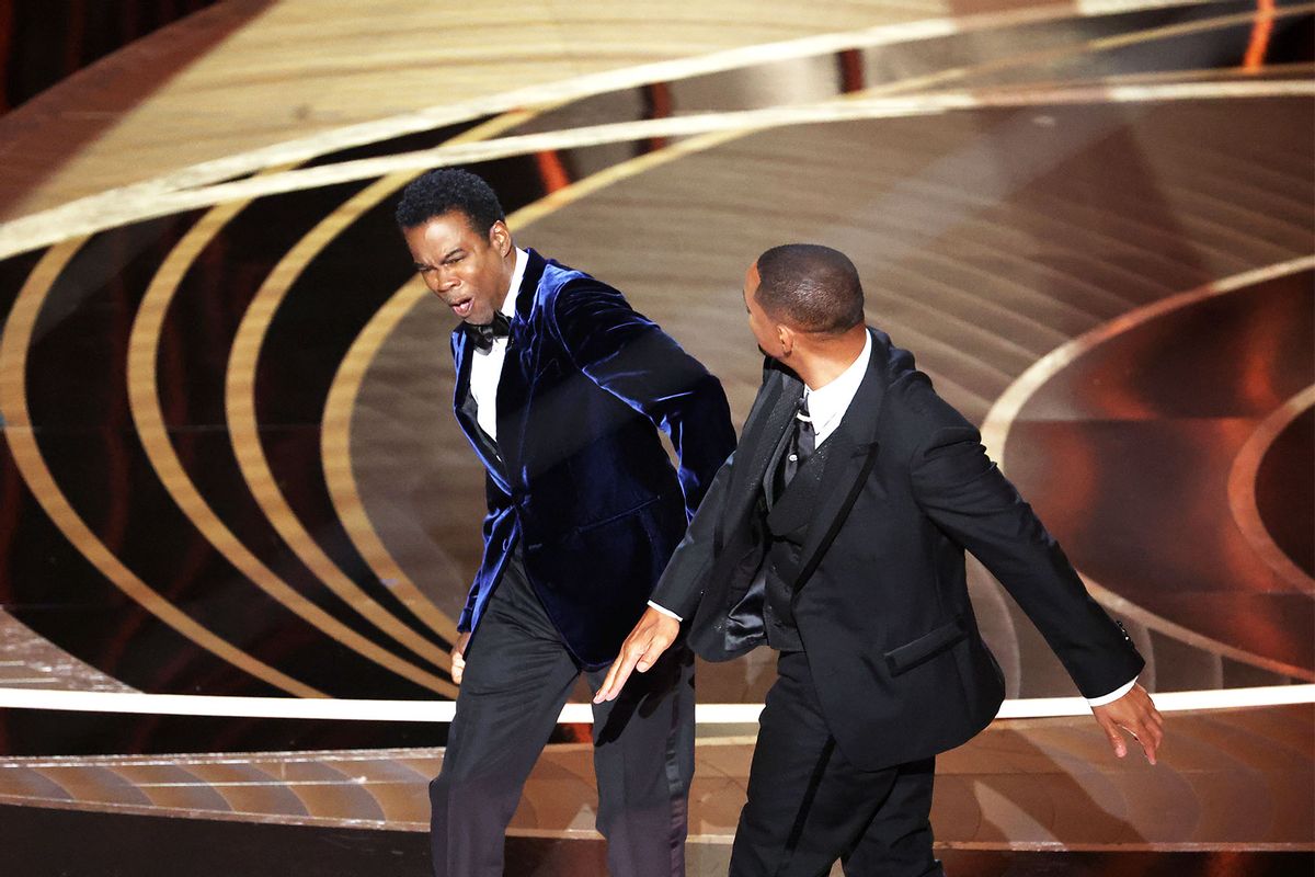 Chris Rock and Will Smith onstage during the show at the 94th Academy Awards at the Dolby Theatre at Ovation Hollywood on Sunday, March 27, 2022. (Myung Chun / Los Angeles Times via Getty Images)