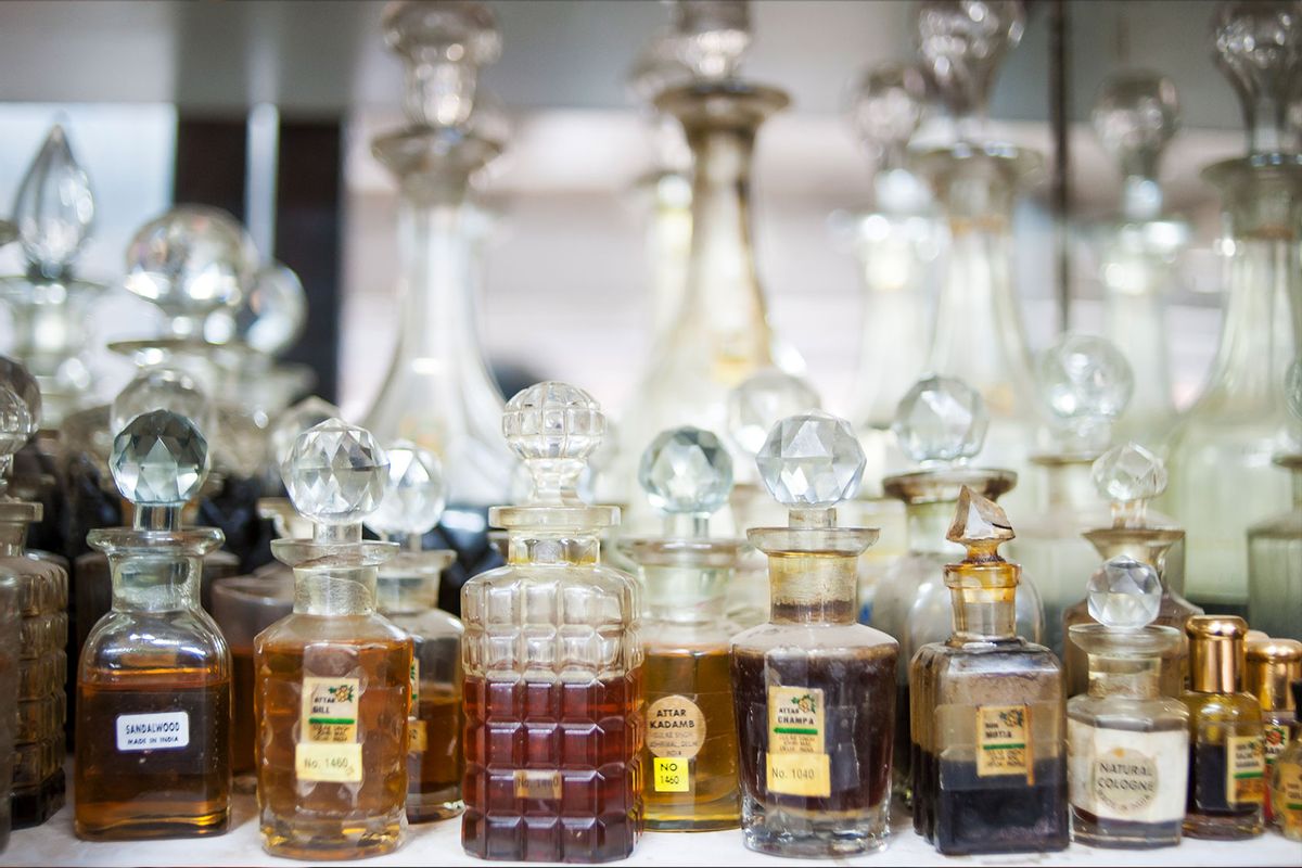 Old perfume bottles on a shelf at the Gulab Singh Johrimal perfume store on November 24, 2015 in Old Delhi, India (Arkaprava Ghosh/Future Publishing via Getty Images)