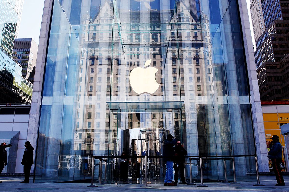 People wait to enter an Apple store on March 10, 2021, in New York. (John Smith/VIEWpress/Getty Images)