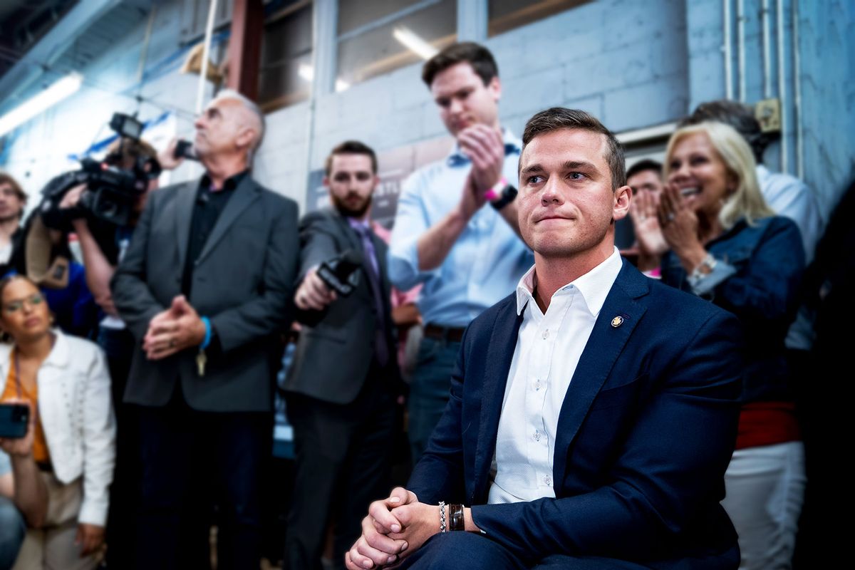 Rep. Madison Cawthorn, R-N.C., talks with reporters and supporters as results from the North Carolina primary election continue to report in at his campaign headquarters on Tuesday, May 17, 2022 in Hendersonville, NC. (Jabin Botsford/The Washington Post via Getty Images)