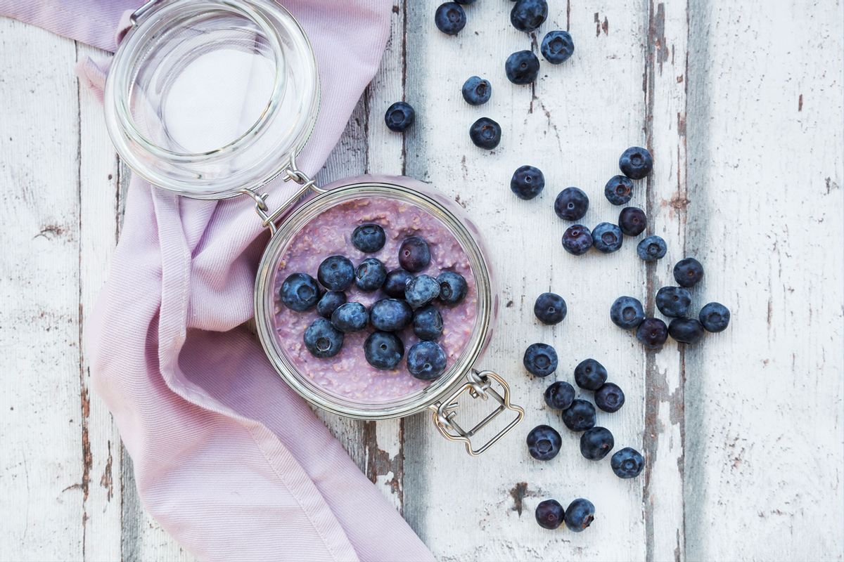 Overnight oats with blueberries in jar (Getty Images/Westend61)