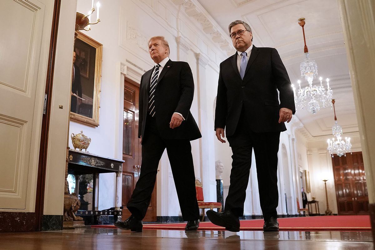 U.S. President Donald Trump (L) and Attorney General William Barr arrive together for the presentation of the Public Safety Officer Medals of Valor in the East Room of the White House May 22, 2019 in Washington, DC. (Chip Somodevilla/Getty Images)