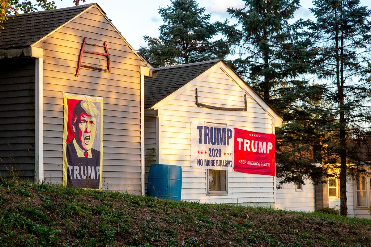 Trump signs and flags adorn sheds in rural Northumberland County near Milton, Pennsylvania. (Paul Weaver/Pacific Press/LightRocket via Getty Images)