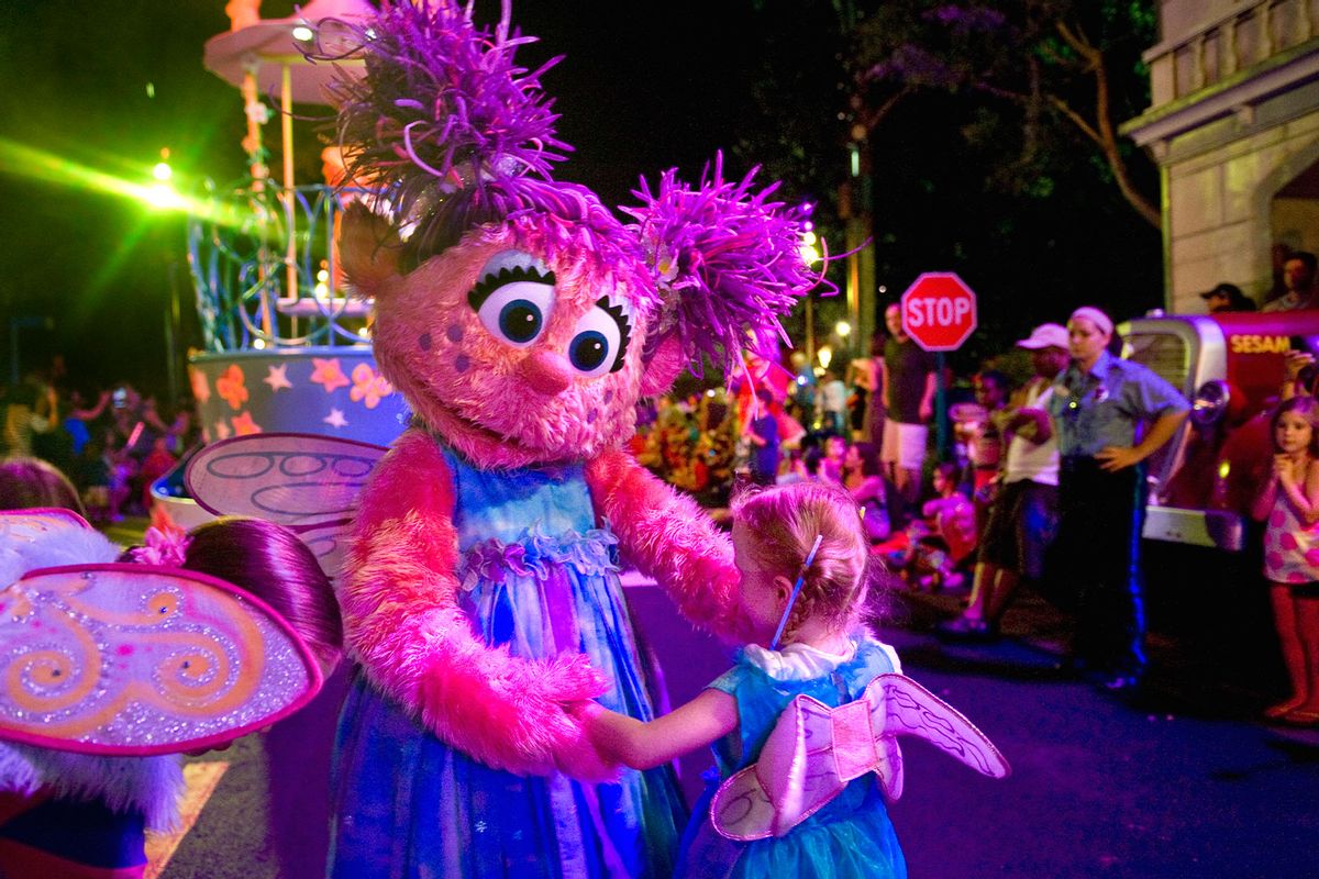 Abby Cadabby finds a look-alike to dance with along the parade route at Sesame Place Thursday, Aug.4, 2011 in Langhorne, PA. (Katherine Frey/The Washington Post via Getty Images)