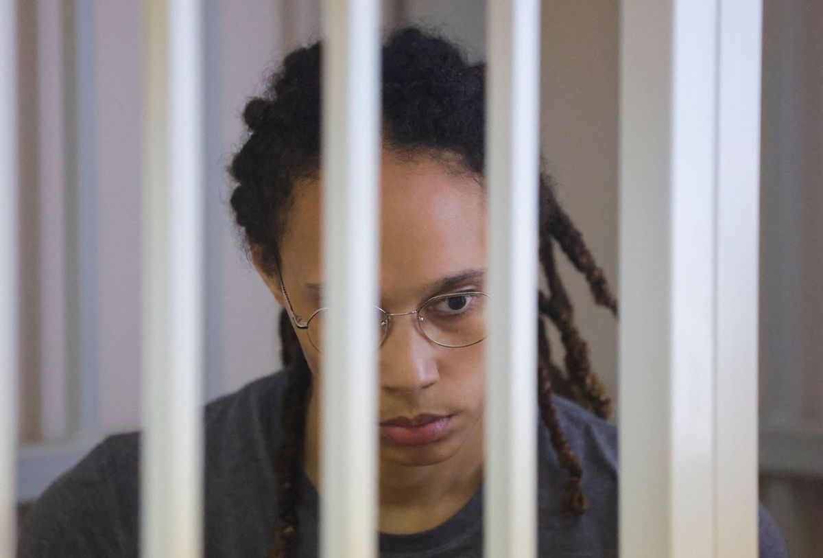 WNBA basketball player Brittney Griner waits for verdict inside a defendants' cage during a hearing in Khimki outside Moscow, on August 4, 2022. (EVGENIA NOVOZHENINA/POOL/AFP via Getty Images)