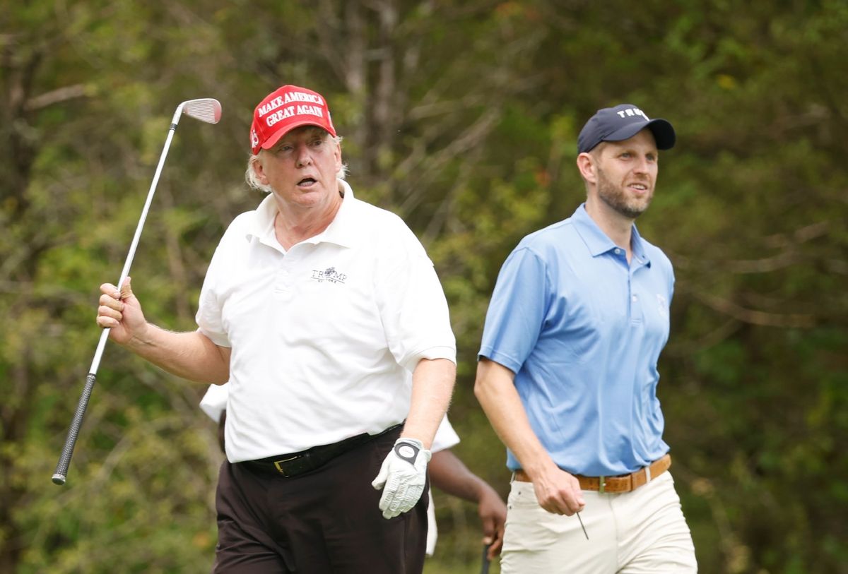 Former U.S. President Donald Trump and son Eric Trump take part in the pro-am prior to the LIV Golf Invitational - Bedminster at Trump National Golf Club Bedminster on July 28, 2022 in Bedminster, New Jersey (Cliff Hawkins/Getty Images)