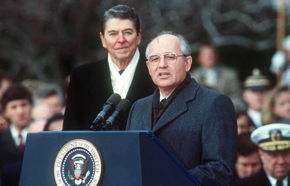 This Dec. 8, 1987, photo shows President Ronald Reagan with Soviet leader Mikhail Gorbachev during welcoming ceremonies at the White House on the first day of their disarmament summit.  (JEROME DELAY/AFP via Getty Images)