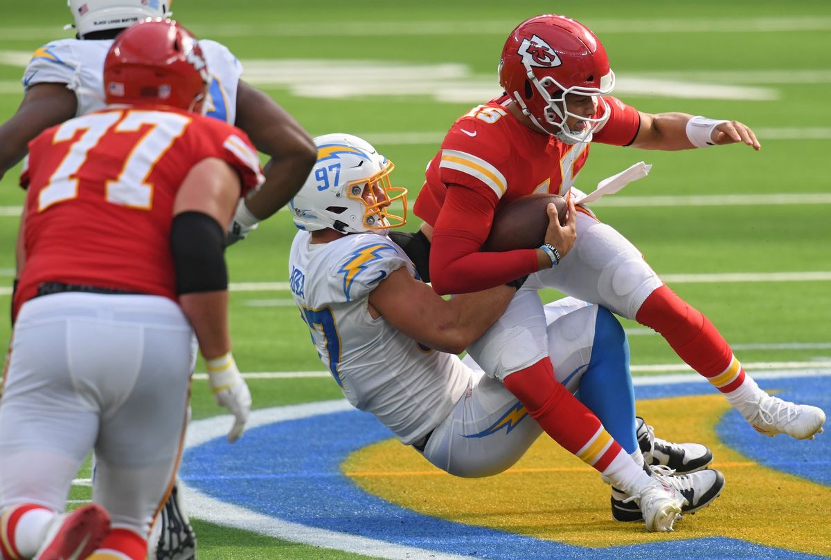 Quarterback Patrick Mahomes #15 of the Kansas City Chiefs is sacked by defensive end Joey Bosa #97 of the Los Angeles Chargers during the third quarter at SoFi Stadium on September 20, 2020 in Inglewood, California (Harry How/Getty Images)