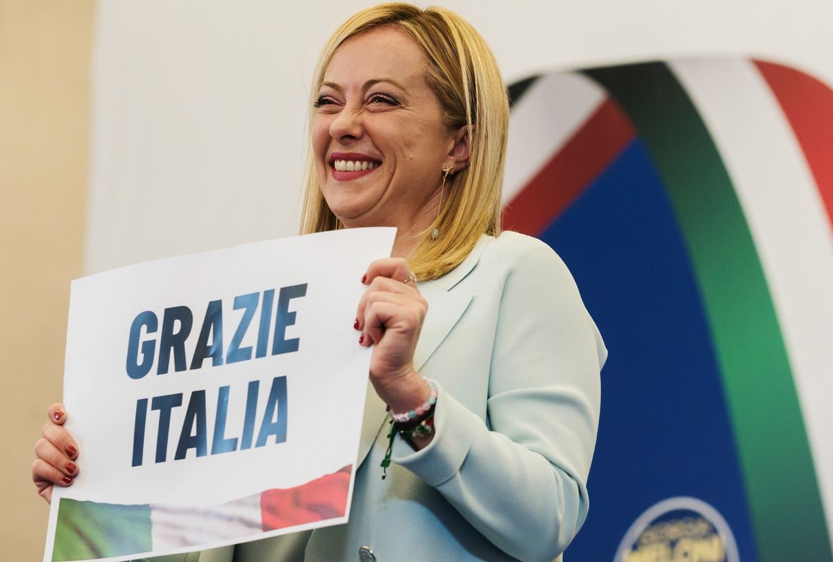 Giorgia Meloni holding a placard quoting "Thanks Italy" after her party's victory at the Italian elections, held on 25 September 2022, at Parco Principi Hotel in Rome. (Valeria Ferraro/SOPA Images/LightRocket via Getty Images)