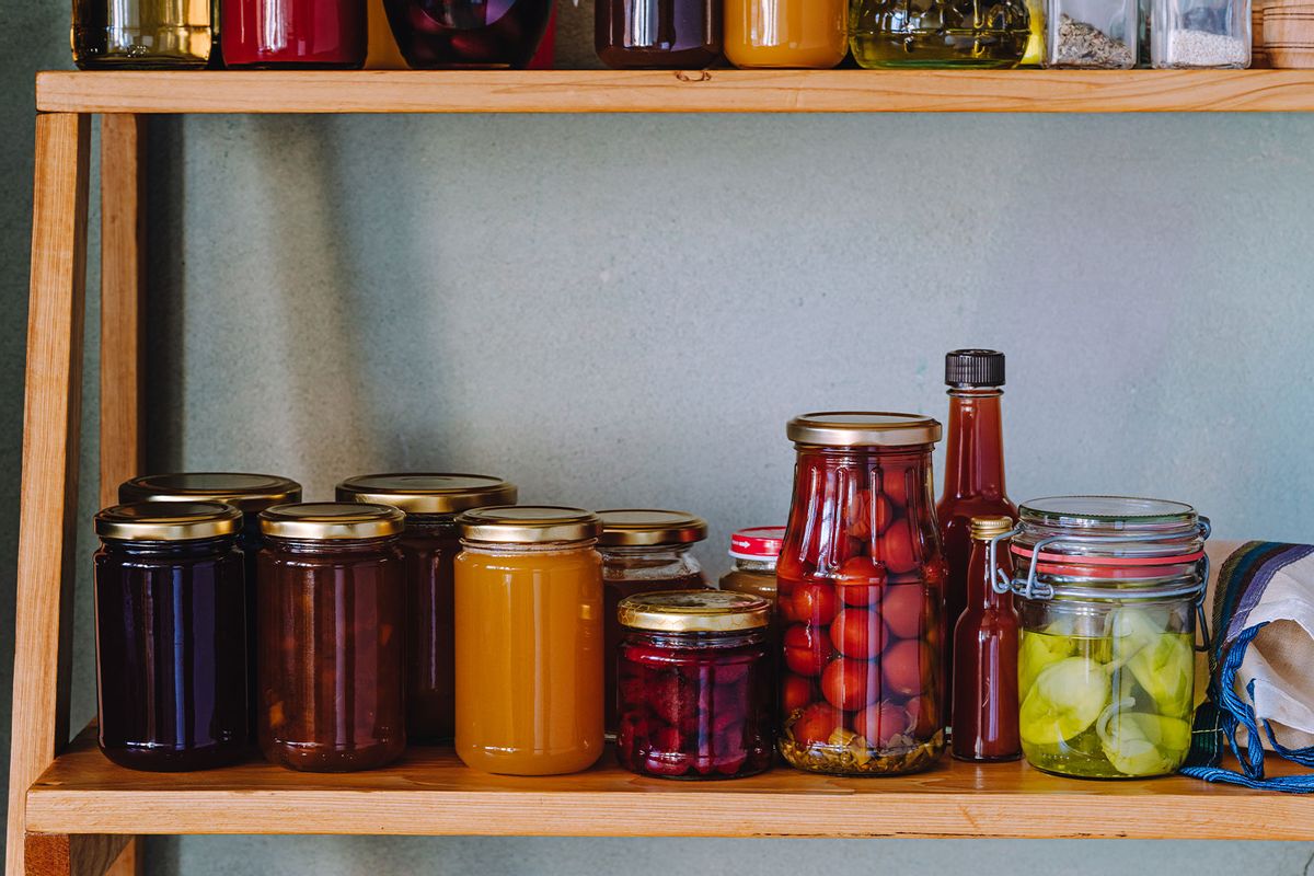 Jams, preserved food and other stable foods on kitchen shelf (Getty Images/istetiana)