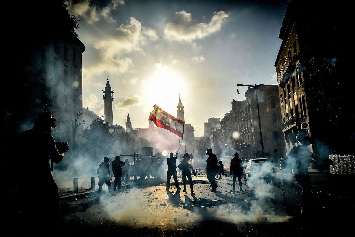 Anti-government protesters take part in a demonstration against the political elites and the government, in Beirut, Lebanon, on August 8, 2020 after the massive explosion at the Port of Beirut. (STR/NurPhoto via Getty Images)