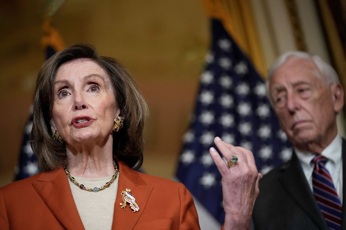 Speaker of the House Nancy Pelosi (D-CA) speaks as House Majority Leader Steny Hoyer (D-MD) looks on at the U.S. Capitol on December 3, 2021 in Washington, DC. (Drew Angerer/Getty Images)