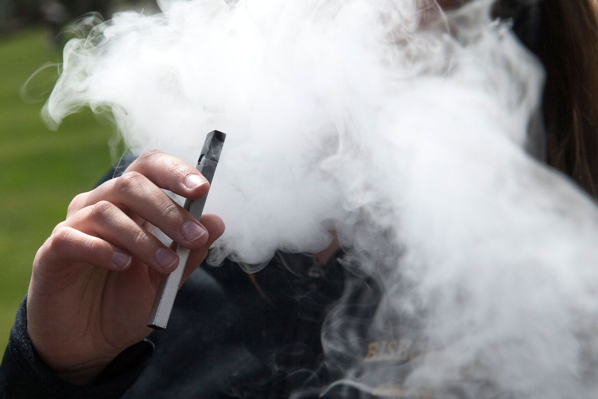 A person smokes a Juul e-cigarette (Jessica Christian/San Francisco Chronicle via Getty Images)