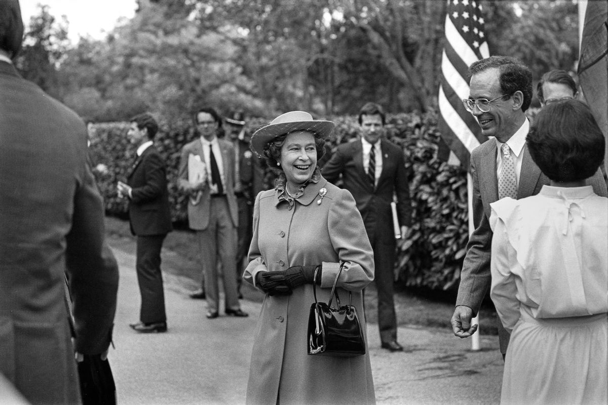 Queen Elizabeth II departs Hoover House following lunch at Stanford University during her West Coast tour of the United States accompanied by Prince Philip on March 3, 1983 in Palo Alto, California. (George Rose/Getty Images)