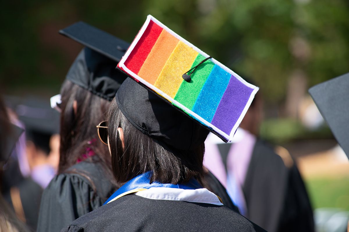 Woman Wears Graduation Cap and Gown Showing Gay Pride (Getty Images/Spiderplay)