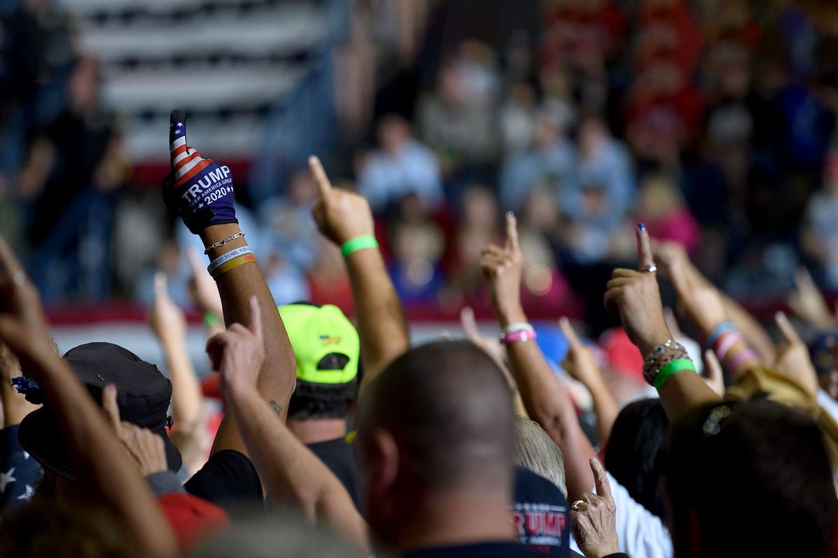 Audience members put their index finger up to symbolize America First while President Donald Trump speaks at a Save America Rally to support Republican candidates running for state and federal offices in the state of Ohio at the Covelli Centre on September 17, 2022 in Youngstown, Ohio. (Jeff Swensen/Getty Images)