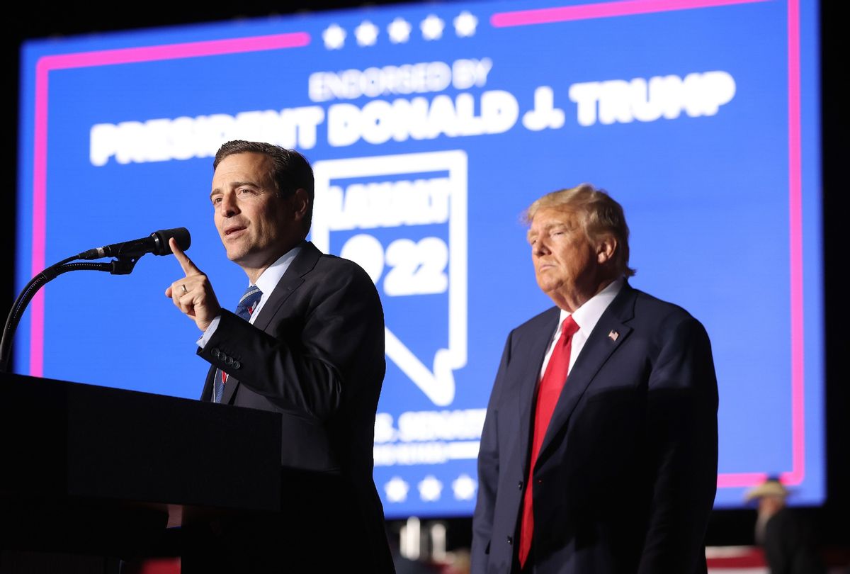 Nevada Republican U.S. Senate candidate Adam Laxalt joins former President Donald Trump on stage during a campaign rally on October 08, 2022 in Minden, Nevada. (Justin Sullivan/Getty Images)