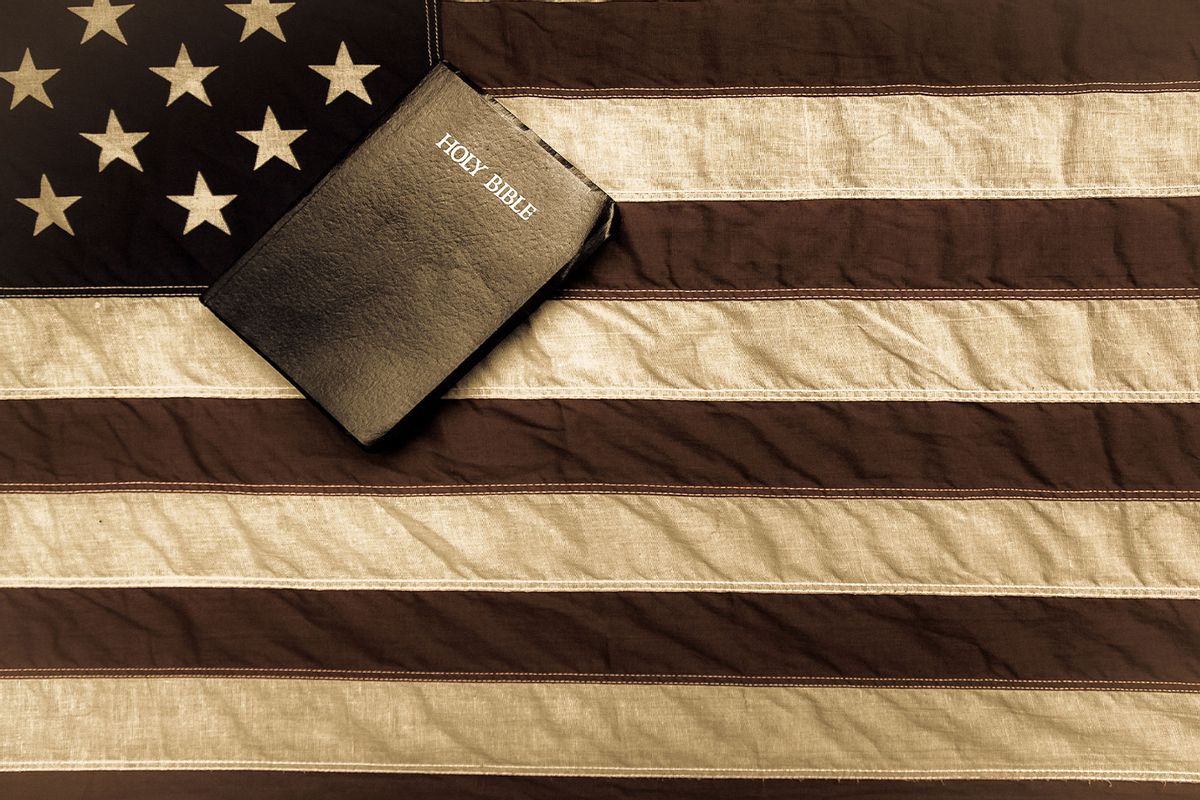 American Flag And Bible (Getty Images/ehrlif)