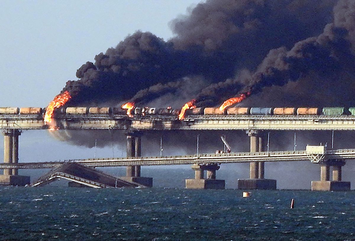 Black smoke billows from a fire on the Kerch bridge that links Crimea to Russia, after a truck exploded, near Kerch, on October 8, 2022. (AFP via Getty Images)