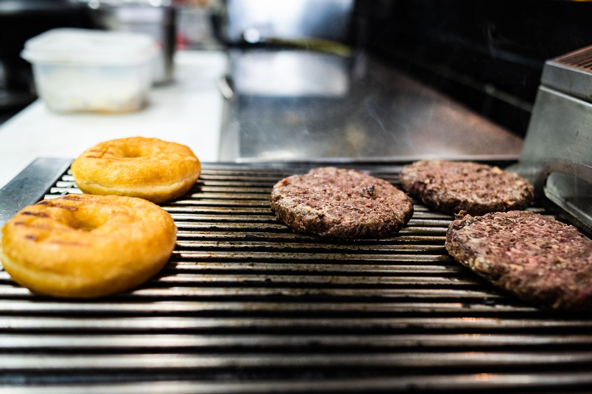Grilled burger with donut bread (Getty Images/pedro arquero)