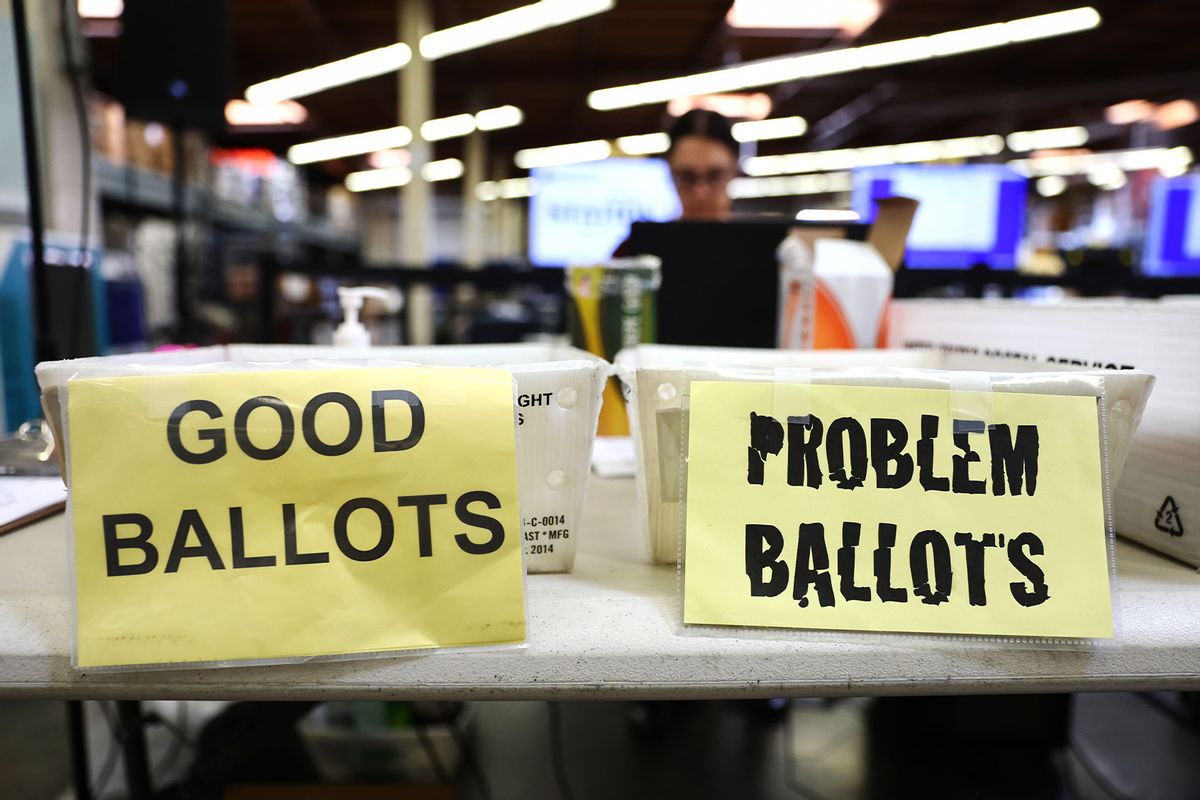 An election worker processes vote-by-mail ballots at the Orange County Registrar of Voters less than two weeks before midterms Election Day on October 27, 2022 in Santa Ana, California. (Mario Tama/Getty Images)