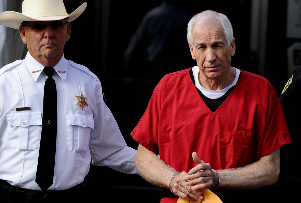 Former Penn State assistant football coach Jerry Sandusky leaves the Centre County Courthouse after being sentenced in his child sex abuse case on October 9, 2012 in Bellefonte, Pennsylvania.  (Patrick Smith/Getty Images)