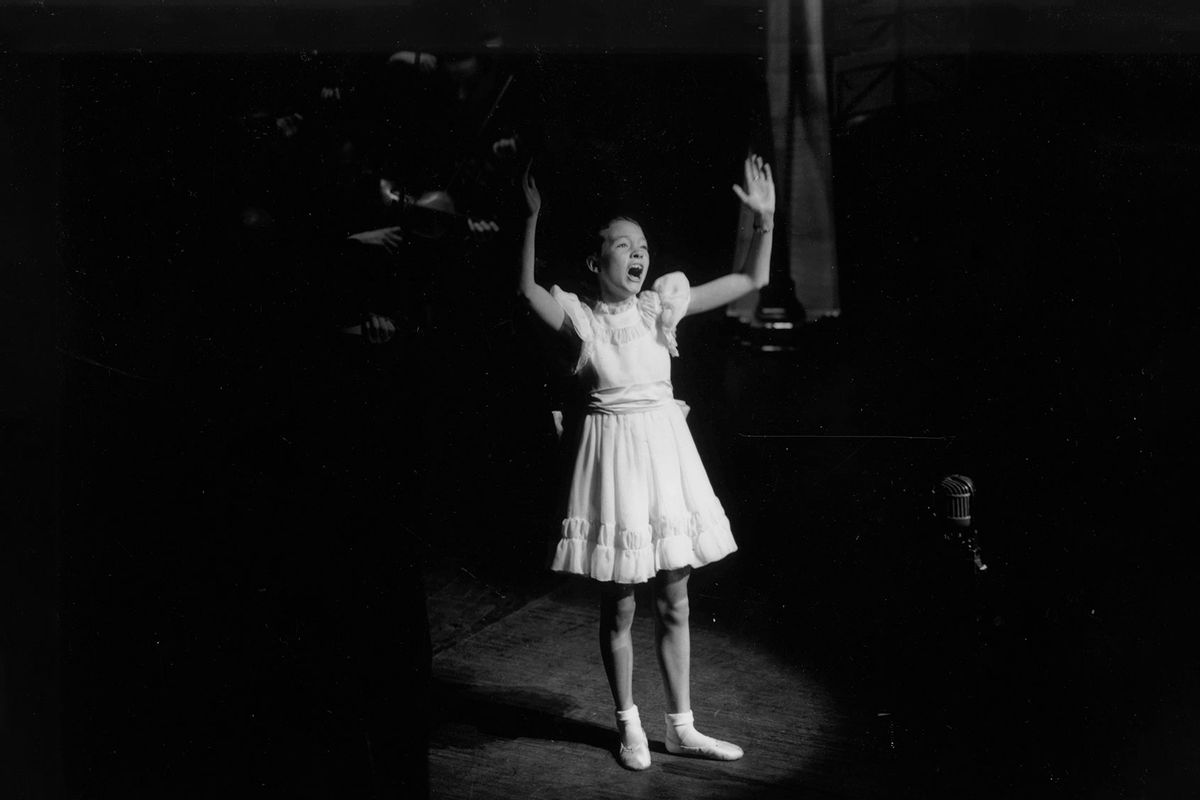 1st November 1948: Julie Andrews as a child singer, performing on stage at the Palladium during a Royal Command Performance. (Keystone/Hulton Archive/Getty Images)