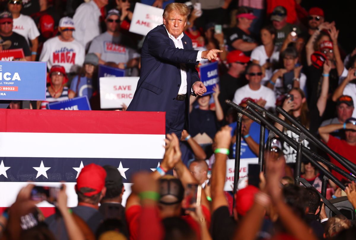 Former U.S. President Donald Trump gestures to the crowd at a campaign rally at Legacy Sports USA on October 09, 2022 in Mesa, Arizona. (Mario Tama/Getty Images)