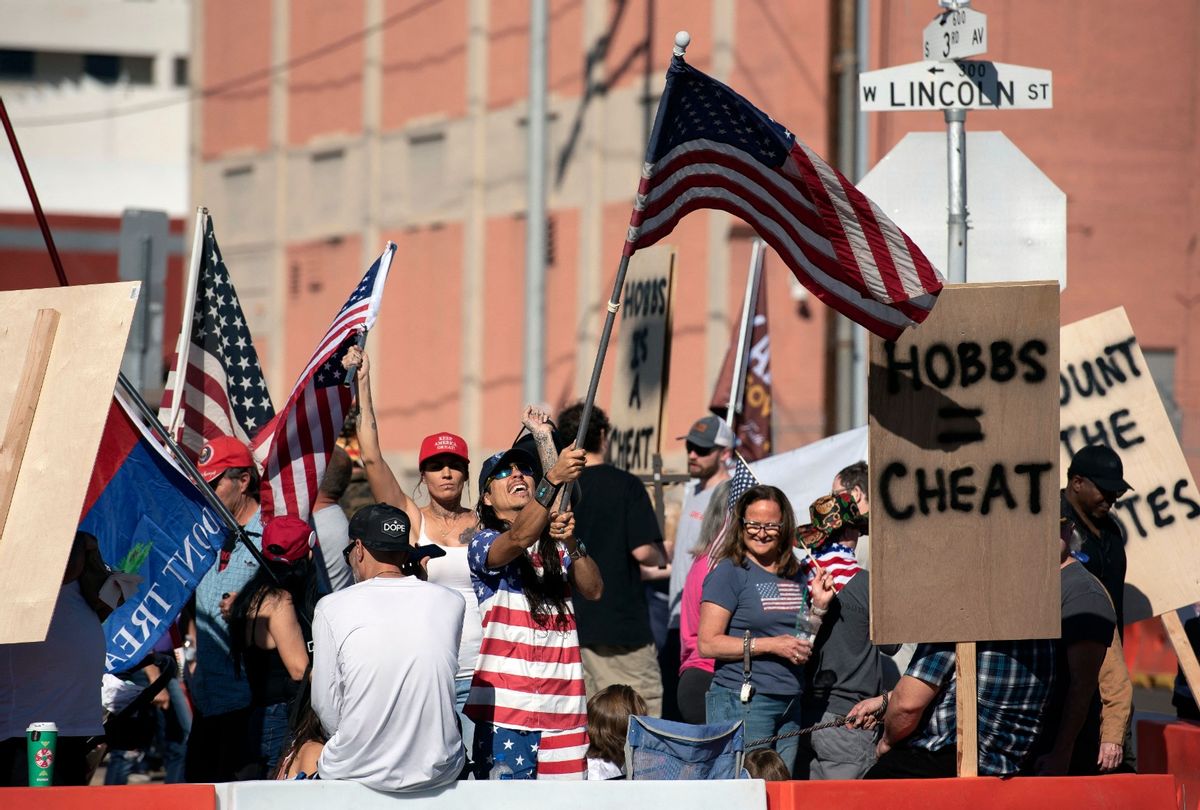 Demonstrators gather at a rally to protest midterm election results outside of Maricopa County Tabulation and Election Center in Phoenix, Arizona, on November 12, 2022.  (REBECCA NOBLE/AFP via Getty Images)