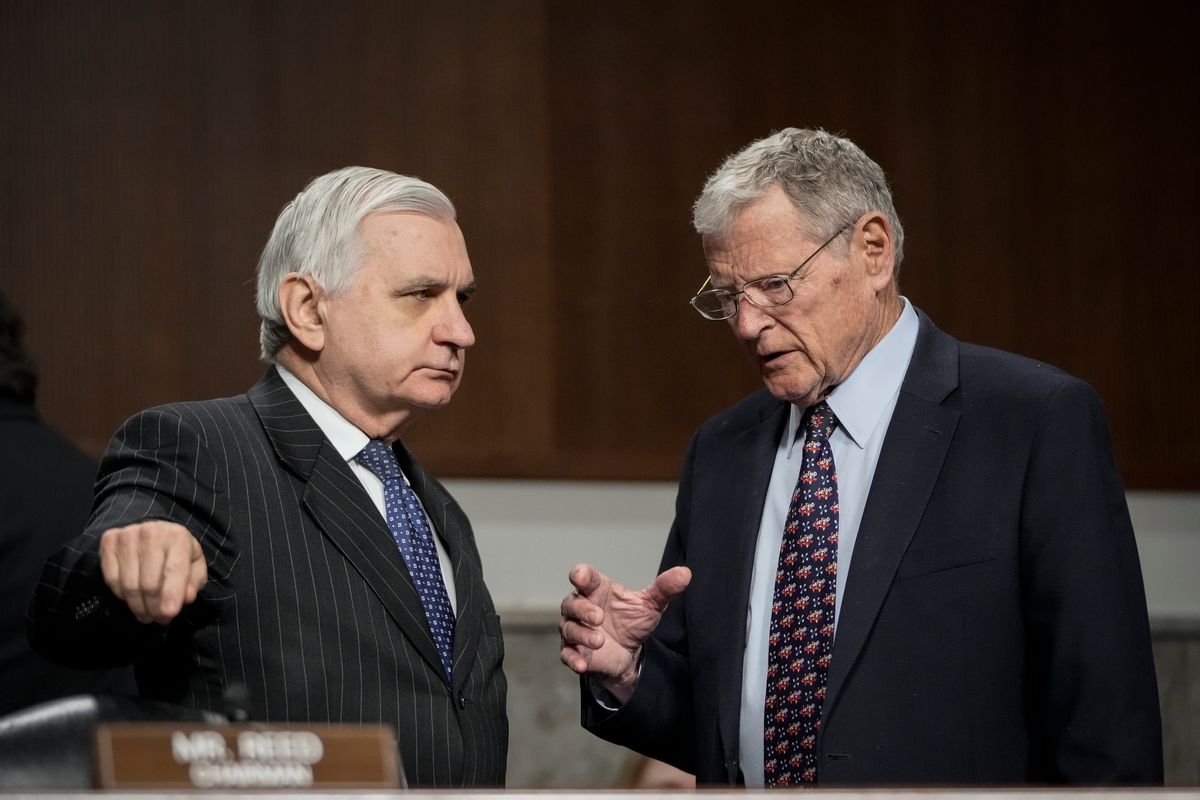 Committee chairman Sen. Jack Reed, D-R.I., talks with ranking member Sen. James Inhofe, R-Okla., before the start of a Senate Armed Services hearing on Capitol Hill, March 15, 2022. (Drew Angerer/Getty Images)