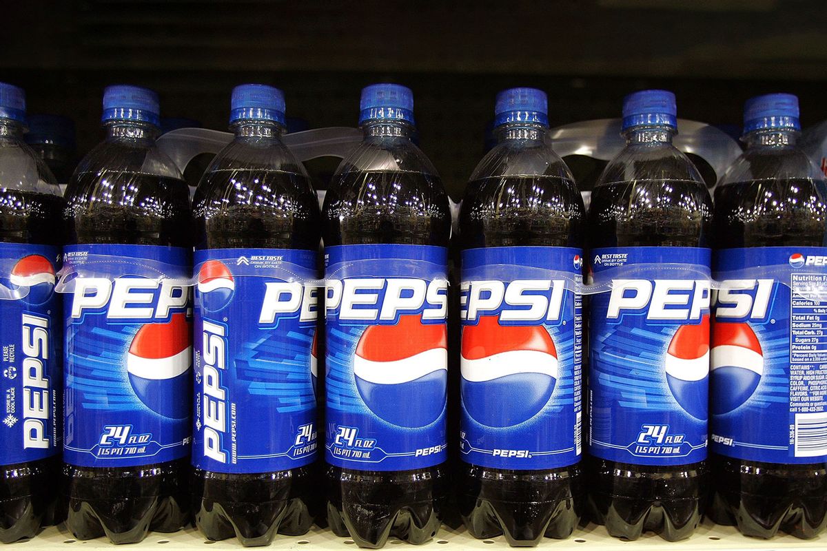 Plastic bottles of Pepsi are displayed on a store shelf (Tim Boyle/Getty Images)