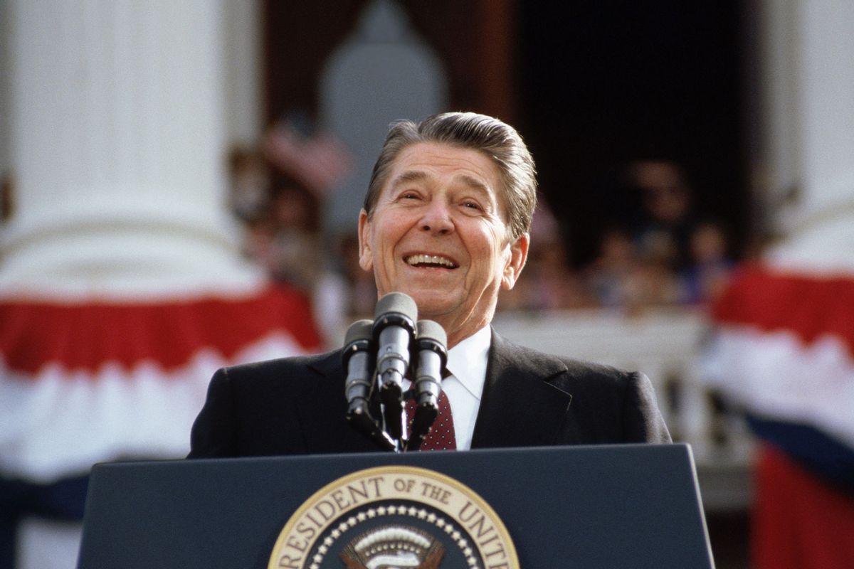 President Ronald Reagan, campaigning for a second term of office, smiles during a rally speech at the California State Capitol the day before the 1984 presidential election. (Wally McNamee/CORBIS/Corbis via Getty Images)
