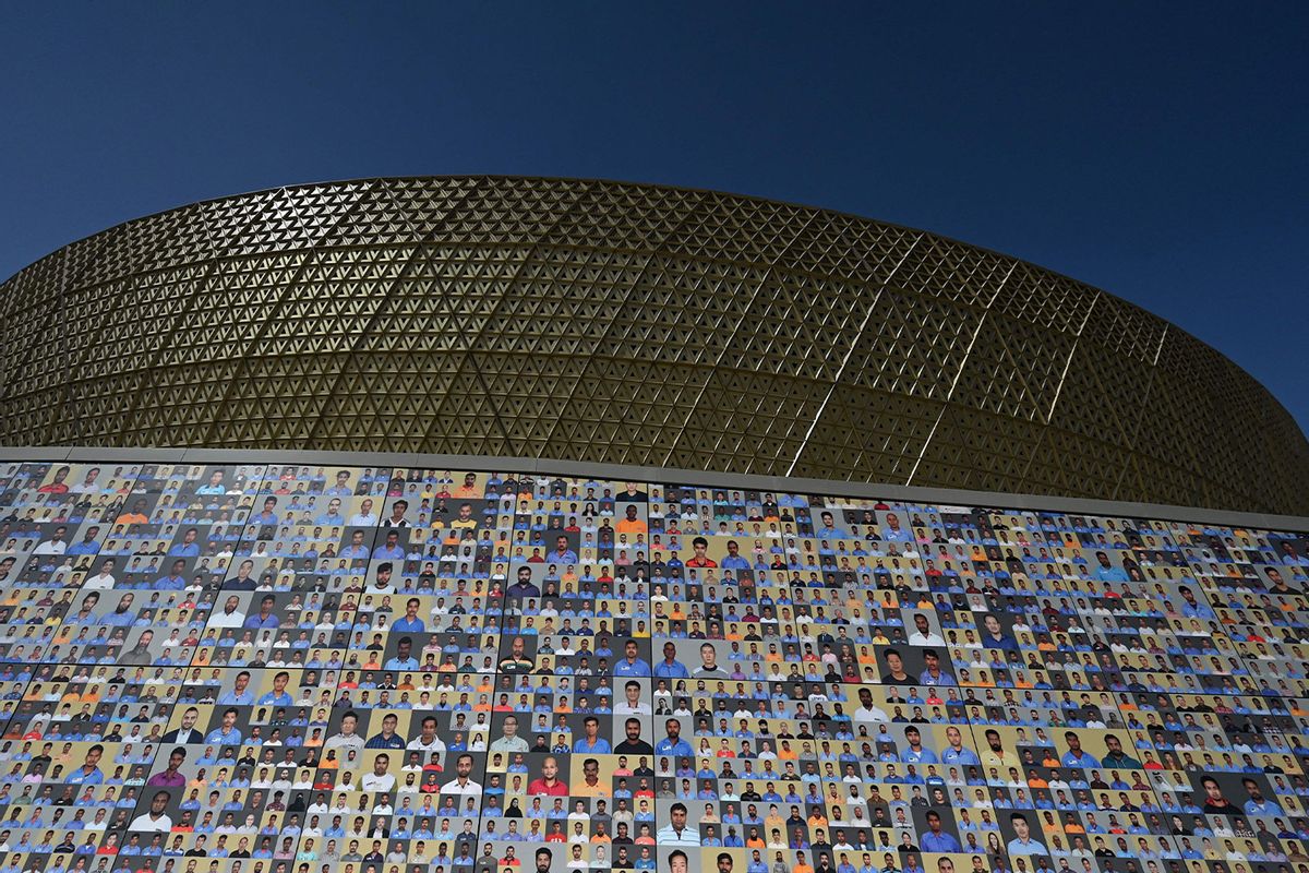 A mosaic made of thousands of photographs of the workers who built the World Cup stadium in Lusail, Qatar, decorates the stadium’s exterior. (GABRIEL BOUYS/AFP via Getty Images)