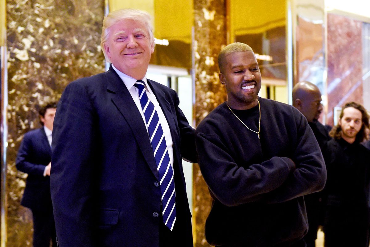 Singer Kanye West and President-elect Donald Trump speak with the press after their meetings at Trump Tower December 13, 2016 in New York. (TIMOTHY A. CLARY/AFP via Getty Images)