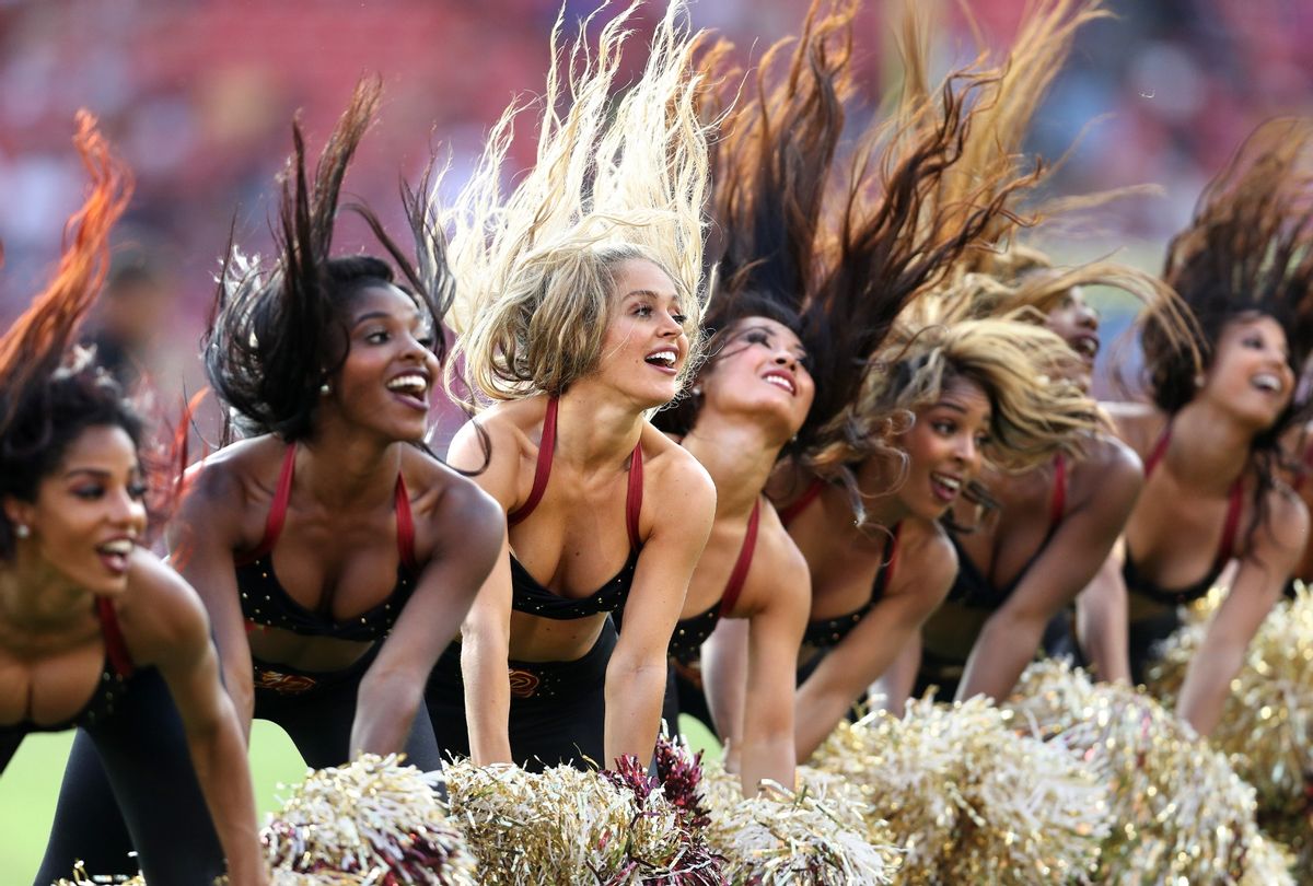 Washington cheerleaders dance during a stoppage in play during a preseason game at FedExField on August 27, 2017 in Landover, Maryland.  (Patrick Smith/Getty Images)