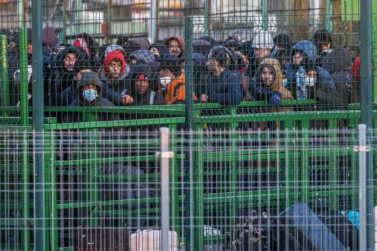 Refugees from Ukraine line up to get in to Poland on border crossing in Medyka, in eastern Poland on February 28, 2022. (WOJTEK RADWANSKI/AFP via Getty Images)