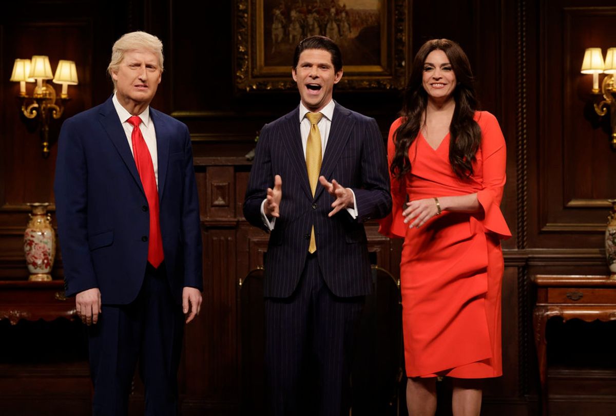 James Austin Johnson as Donald Trump, Mikey Day as Donald Trump Jr., and Cecily Strong as Kimberly Guilfoyle during the “Trump NFT” Cold Open on Saturday Night Live, December 17, 2022  (Will Heath/NBC)