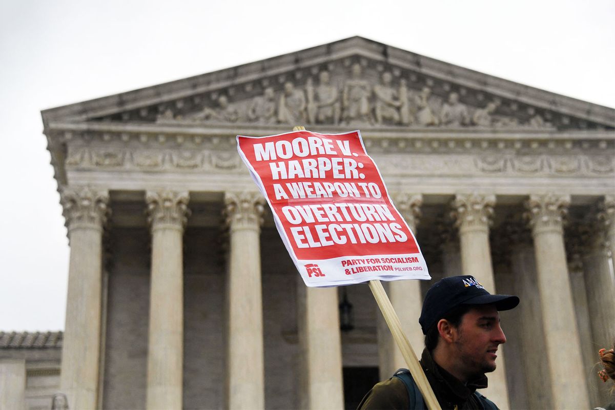 Demonstrators gather in front of the US Supreme Court in Washington, DC, on December 7, 2022. (OLIVIER DOULIERY/AFP via Getty Images)
