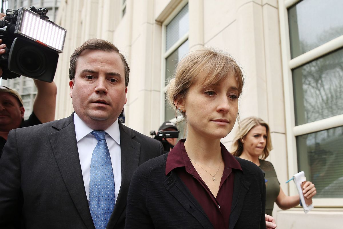 Actress Allison Mack (R) departs the United States Eastern District Court after a bail hearing in relation to the sex trafficking charges filed against her on May 4, 2018 in the Brooklyn borough of New York City. (Jemal Countess/Getty Images)