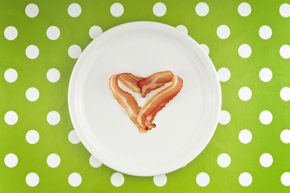Bacon strips in the shape of a heart (Getty Images/stevanovicigor)