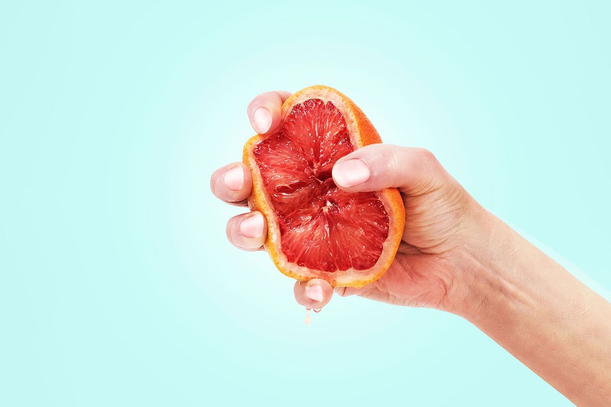 Squeezing Grapefruit (Getty Images/Juj Winn)