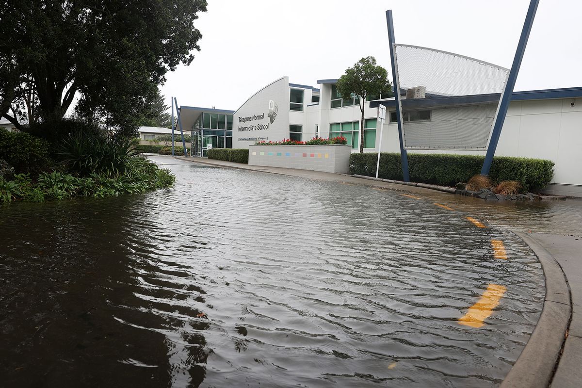 Takapuna Normal Intermediate school entrance is flooded on February 01, 2023 in Auckland, New Zealand.  (Fiona Goodall/Getty Images)
